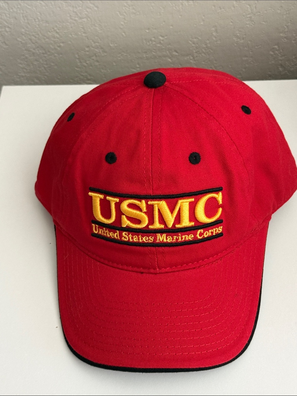 The Game Red USMC Embroidered Baseball Cap with Yellow Logo